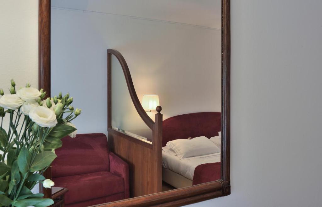Postel nebo postele na pokoji v ubytování Hotel Hannover
