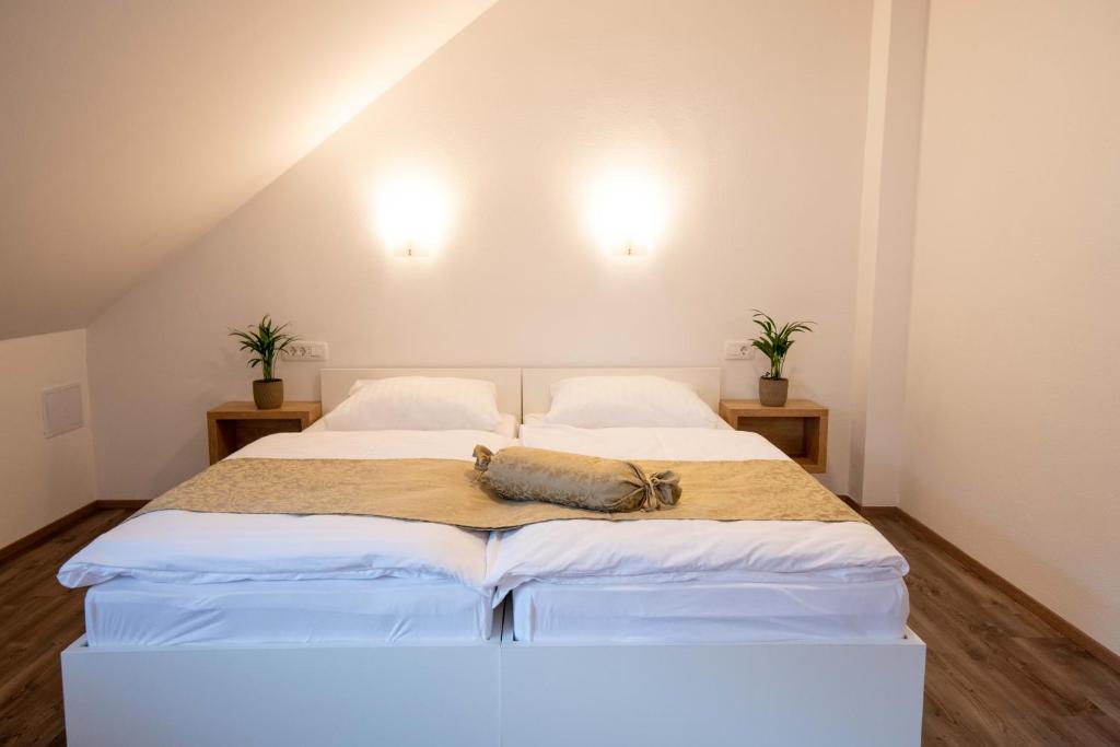Postel nebo postele na pokoji v ubytování Guesthouse Stari Mayr