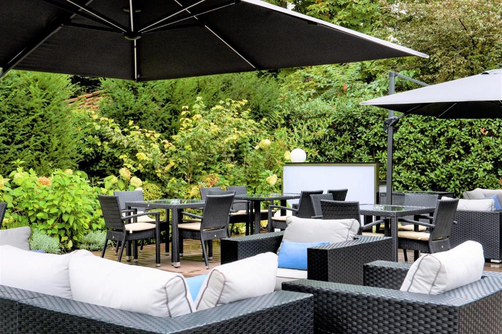 Um jardim em Villa Westend Hotel an der Messe