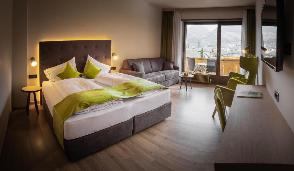 Postel nebo postele na pokoji v ubytování Hotel und Residence Johanneshof