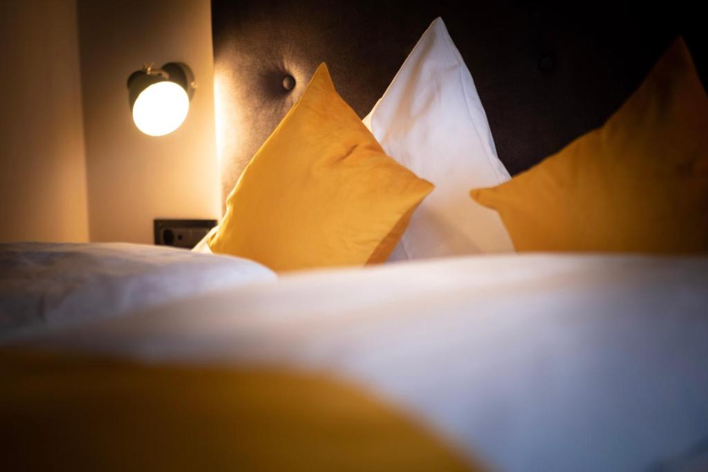 Postel nebo postele na pokoji v ubytování Hotel und Residence Johanneshof