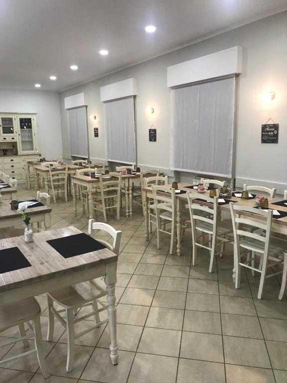 Reštaurácia alebo iné gastronomické zariadenie v ubytovaní A casa di Titty