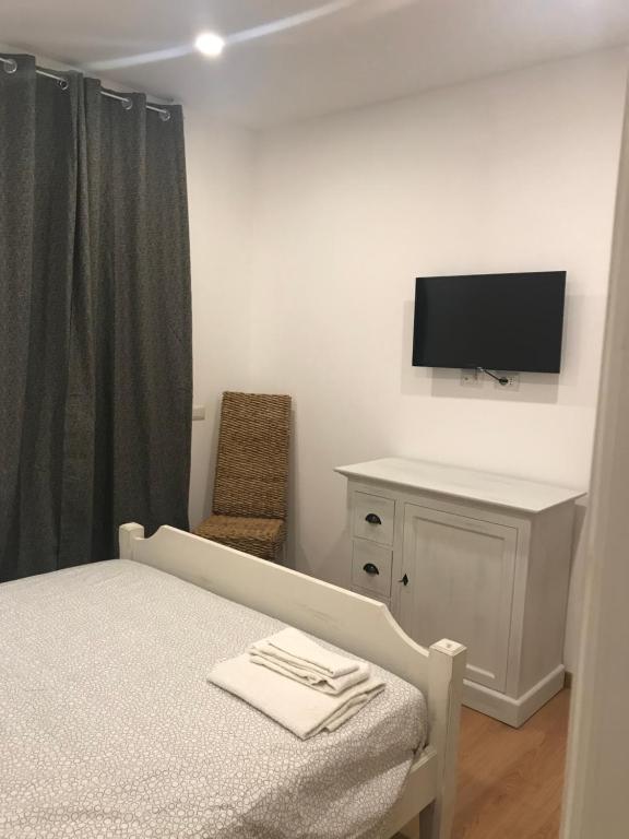 Televízia a/alebo spoločenská miestnosť v ubytovaní A casa di Titty