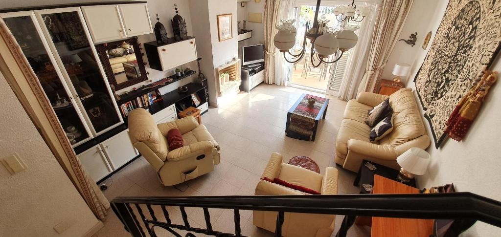 an aerial view of a living room with furniture at Casa Valerie GM003 in Guardamar del Segura