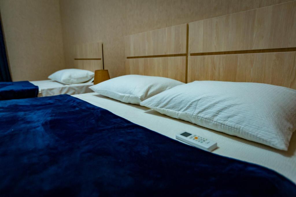 Postel nebo postele na pokoji v ubytování Boutique Hotel Talaveri In Telavi