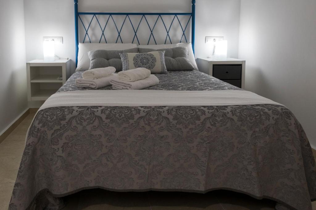 Postel nebo postele na pokoji v ubytování APARTAMENTO PALO CORTAO
