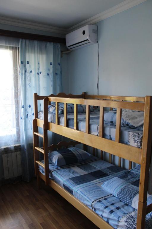Postel nebo postele na pokoji v ubytování Arm Hostel