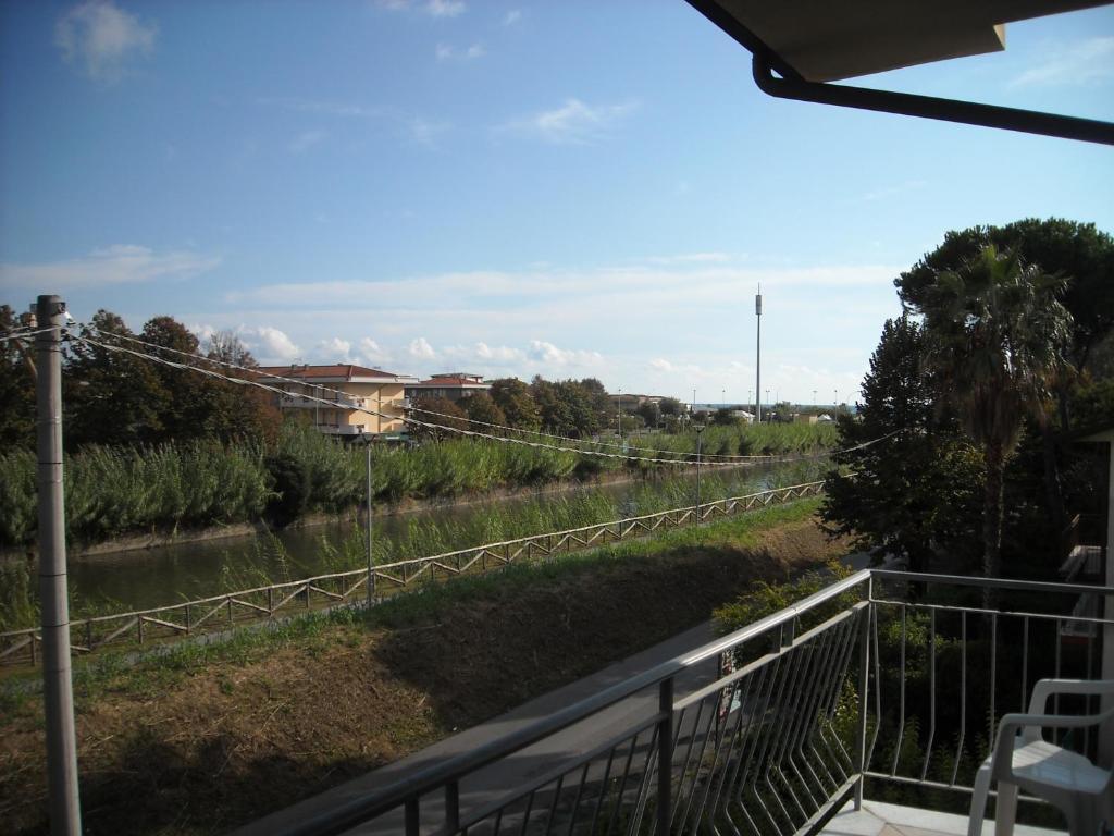 a view of a river from a balcony at Paladini Apartment 1st Floor in Massa