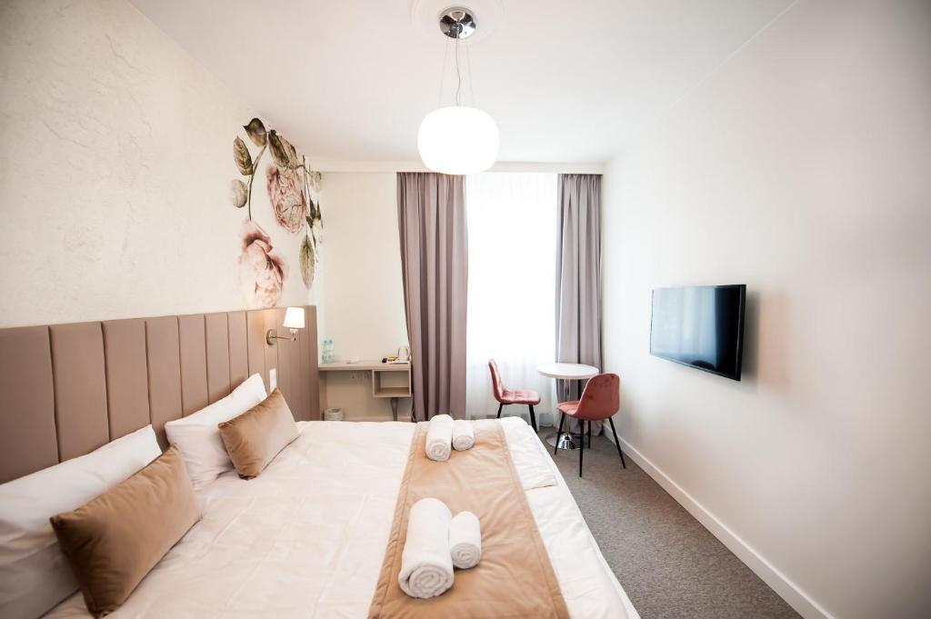 TV a/nebo společenská místnost v ubytování Hotel Gdynia Boutique