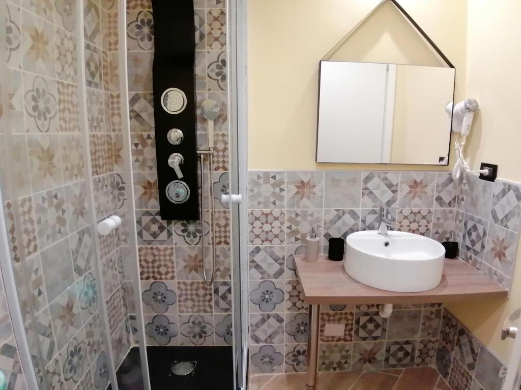 Koupelna v ubytování Domus La Foce Hotel