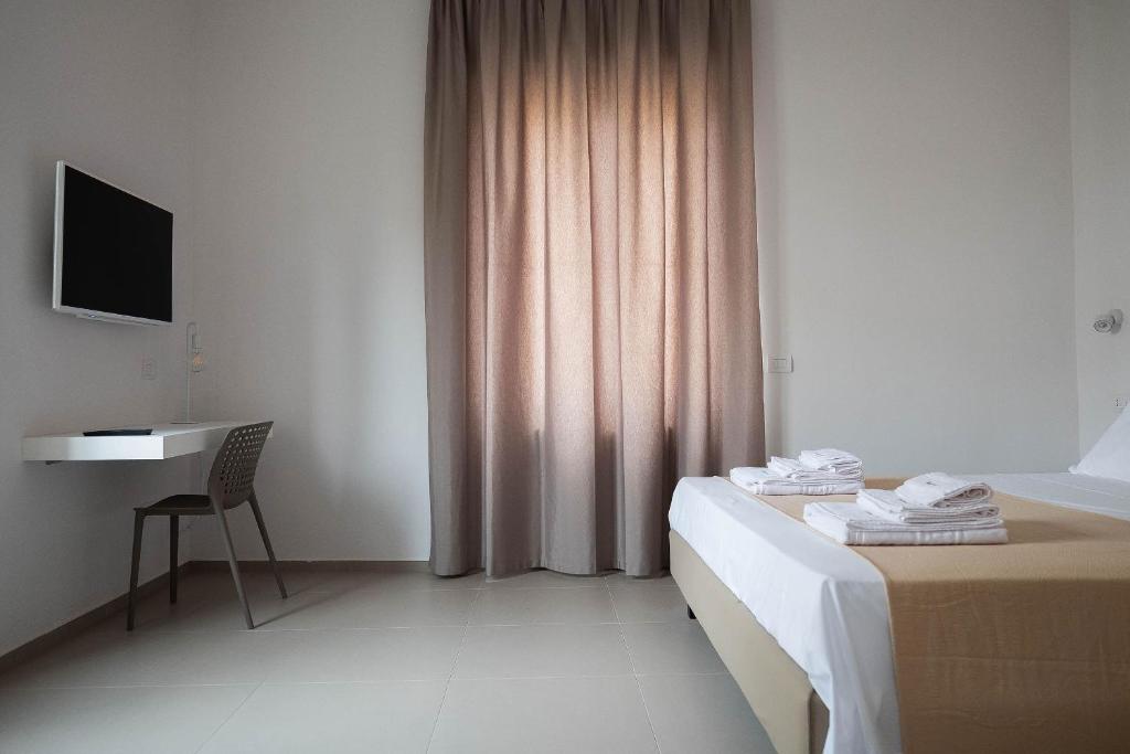 Postel nebo postele na pokoji v ubytování MaisonMe
