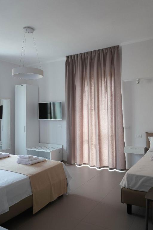 Postel nebo postele na pokoji v ubytování MaisonMe