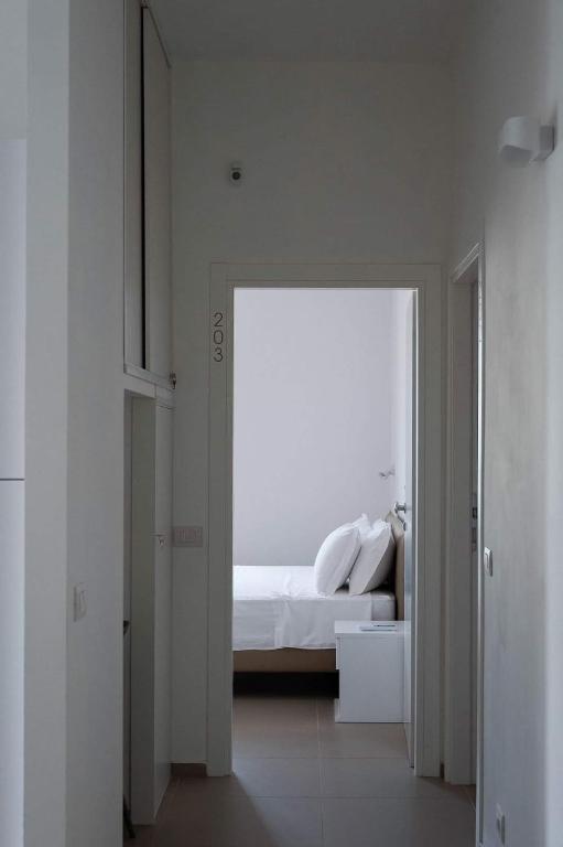 Postel nebo postele na pokoji v ubytování MaisonMe