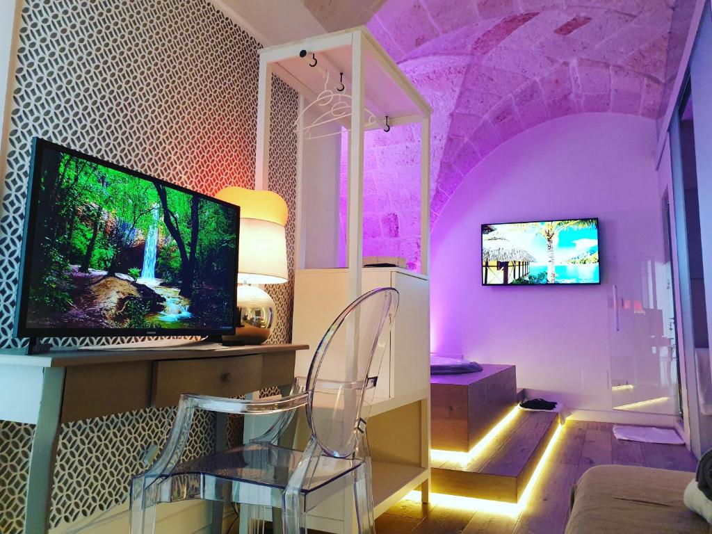 TV a/nebo společenská místnost v ubytování Christian's Suites & Spa