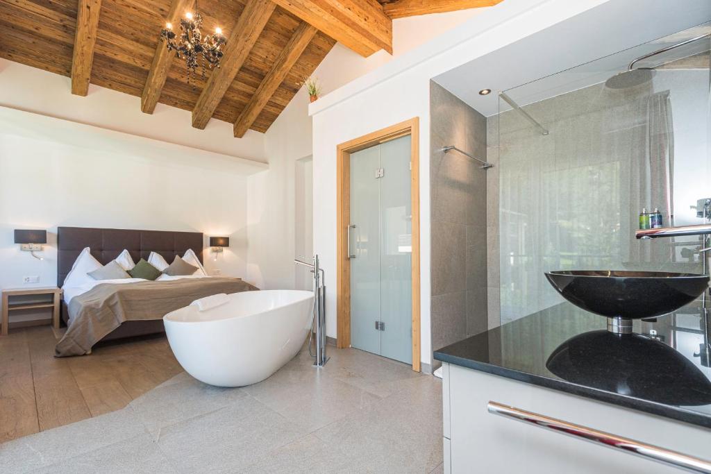 Postel nebo postele na pokoji v ubytování Matthiol Appartements