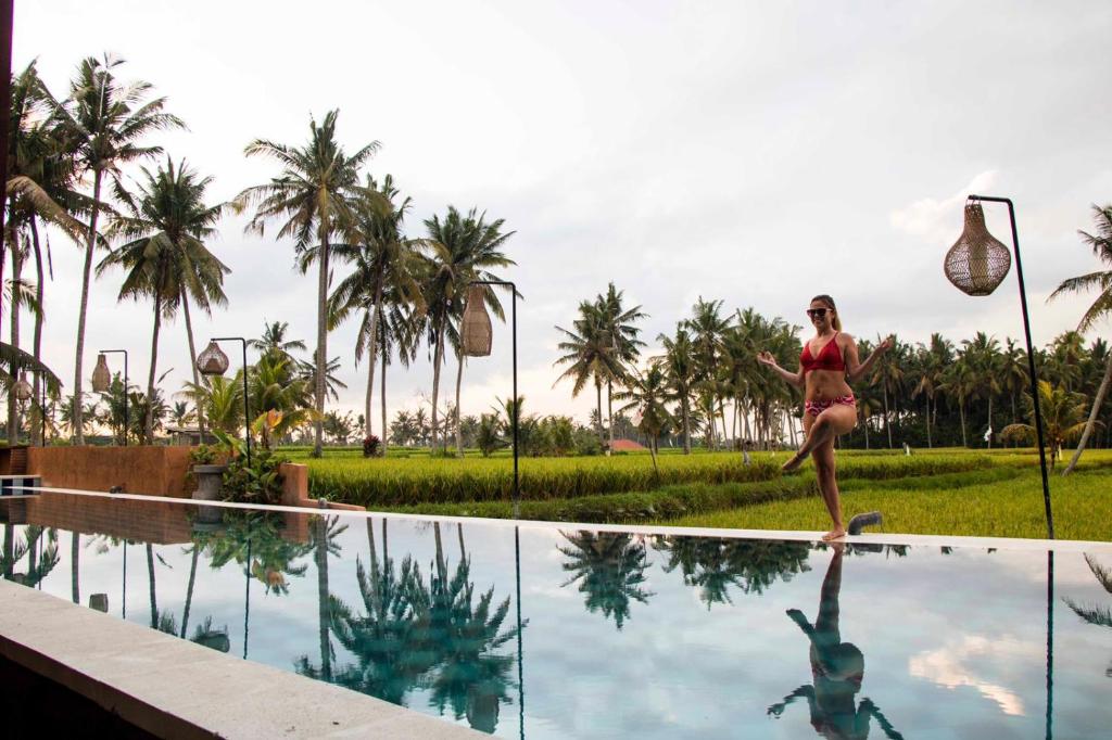 Bazén v ubytování The Sawah Resort & Villa nebo v jeho okolí