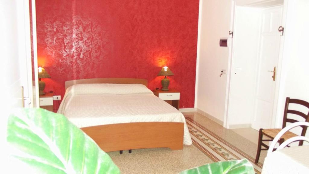 Posteľ alebo postele v izbe v ubytovaní B&B Vico Vacanze
