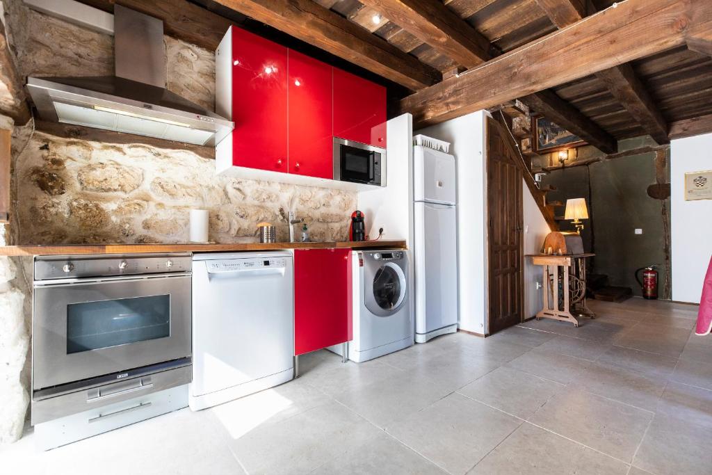 A kitchen or kitchenette at Adrados Mar de Pinos