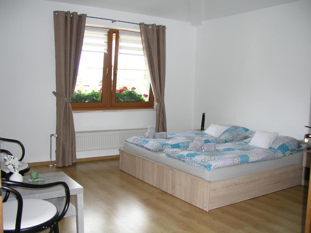 Postel nebo postele na pokoji v ubytování Villa Vlasta