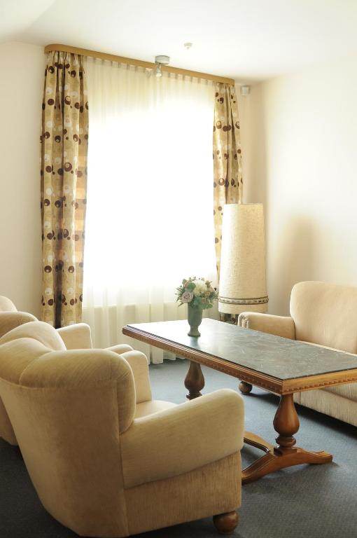 Posezení v ubytování Amicus Hotel
