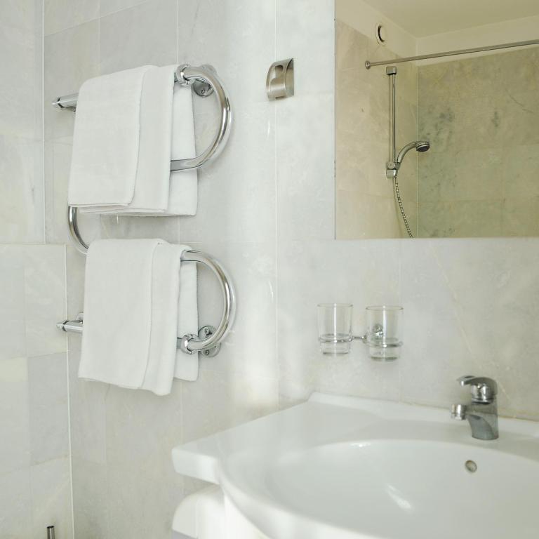 Koupelna v ubytování Amicus Hotel