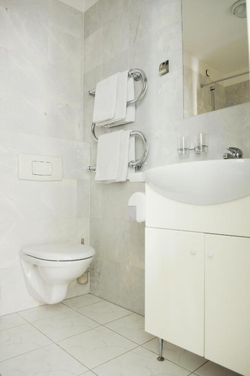 Koupelna v ubytování Amicus Hotel