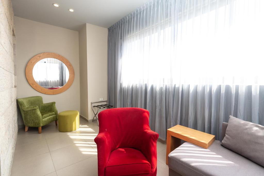 Area soggiorno di Hillel 11 Hotel