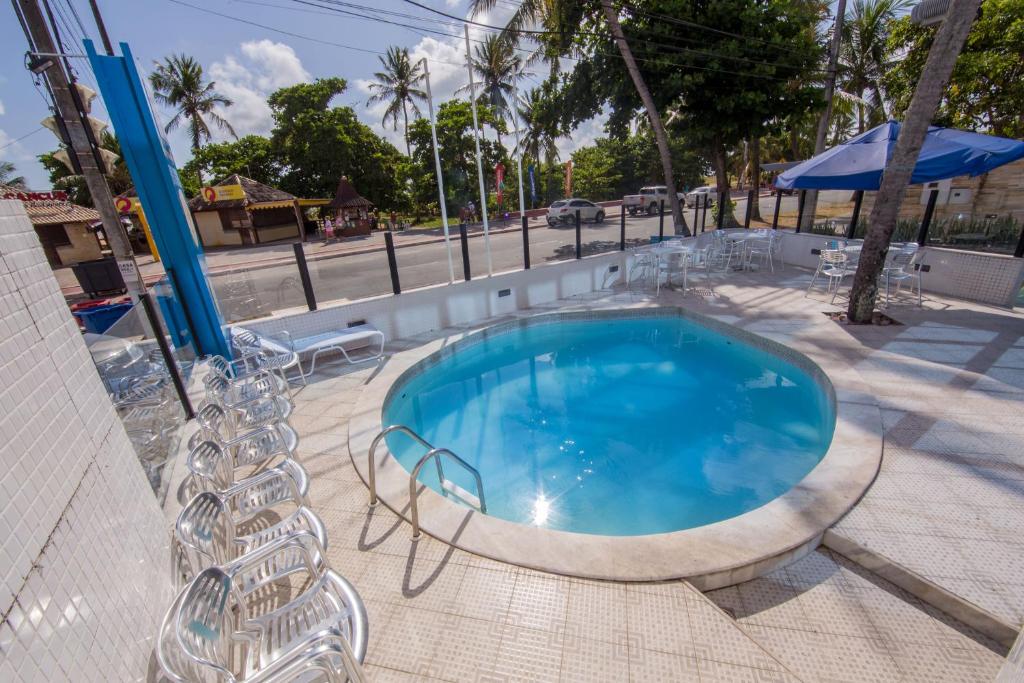 A piscina localizada em VOA Ambassador Flat ou nos arredores