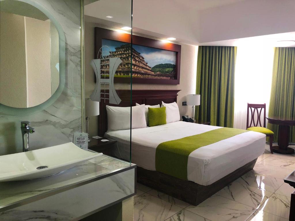Postel nebo postele na pokoji v ubytování Hotel Lois Veracruz