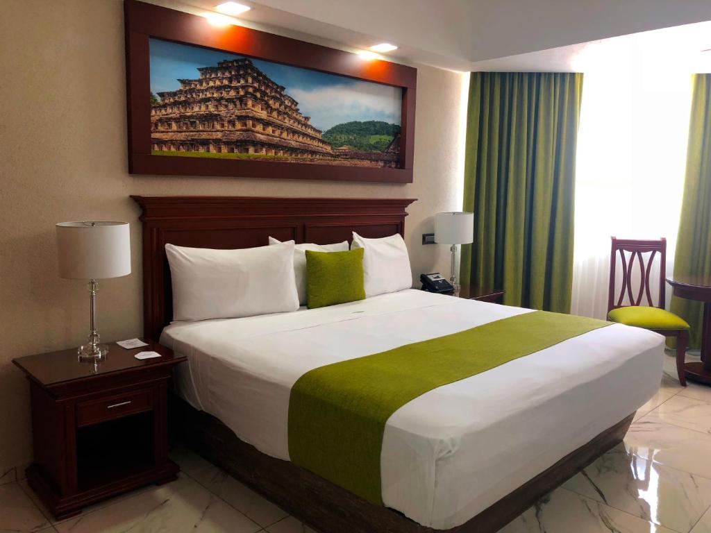 Postel nebo postele na pokoji v ubytování Hotel Lois Veracruz
