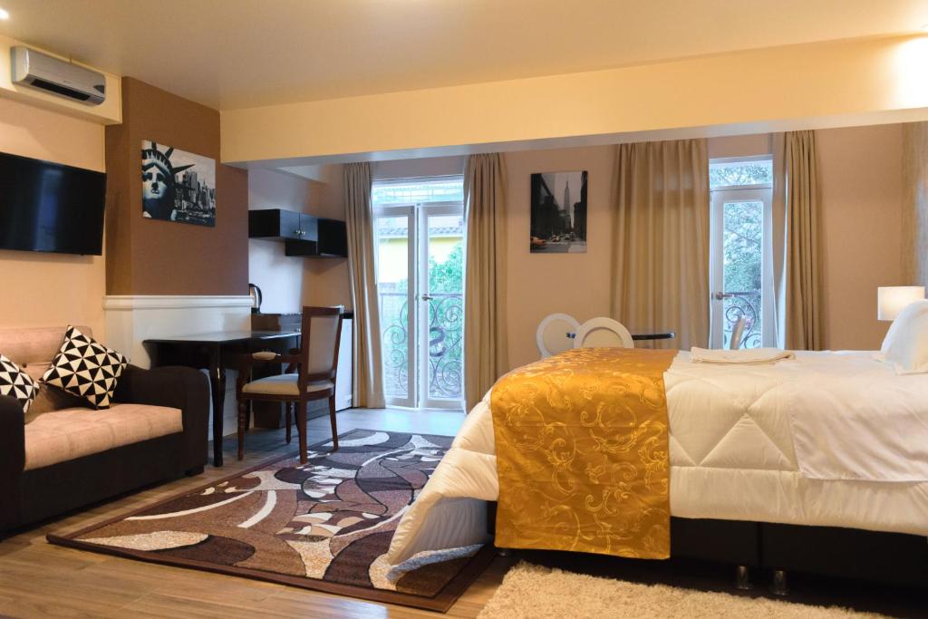 TV a/nebo společenská místnost v ubytování Hotel Paradis Suite Cusco