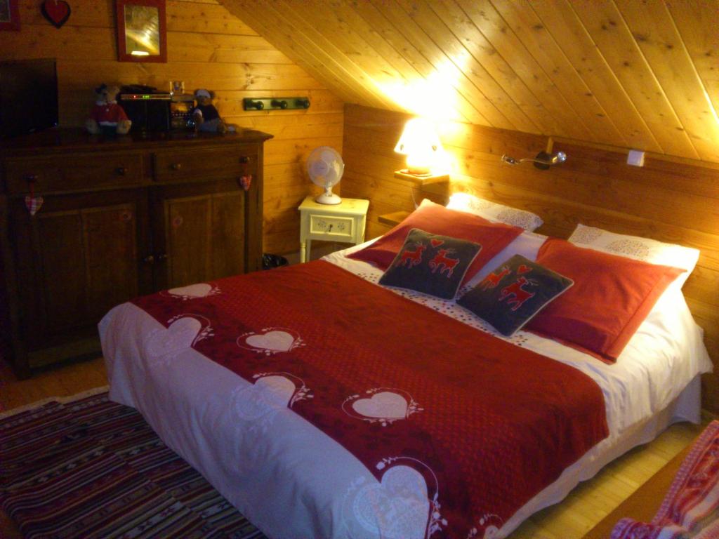 Postel nebo postele na pokoji v ubytování Chalet Gérardmer situé a LE THOLY