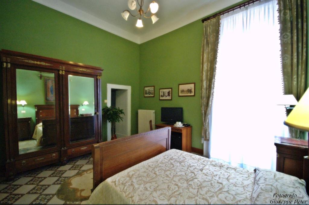 Postel nebo postele na pokoji v ubytování B&B Casa Cavalli