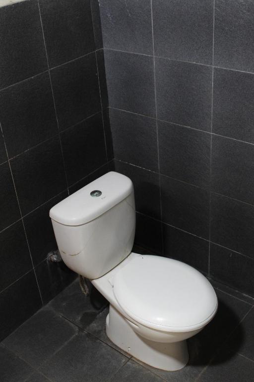 Koupelna v ubytování Harrys Oceanhouse 2 Pacitan