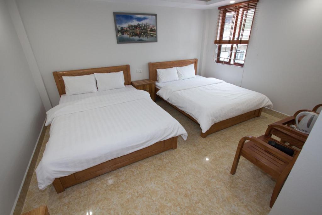 Postel nebo postele na pokoji v ubytování Flaco Hostel Sapa