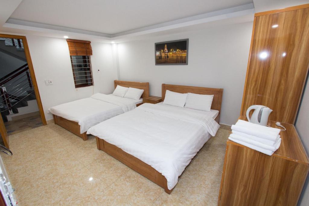 Postel nebo postele na pokoji v ubytování Flaco Hostel Sapa