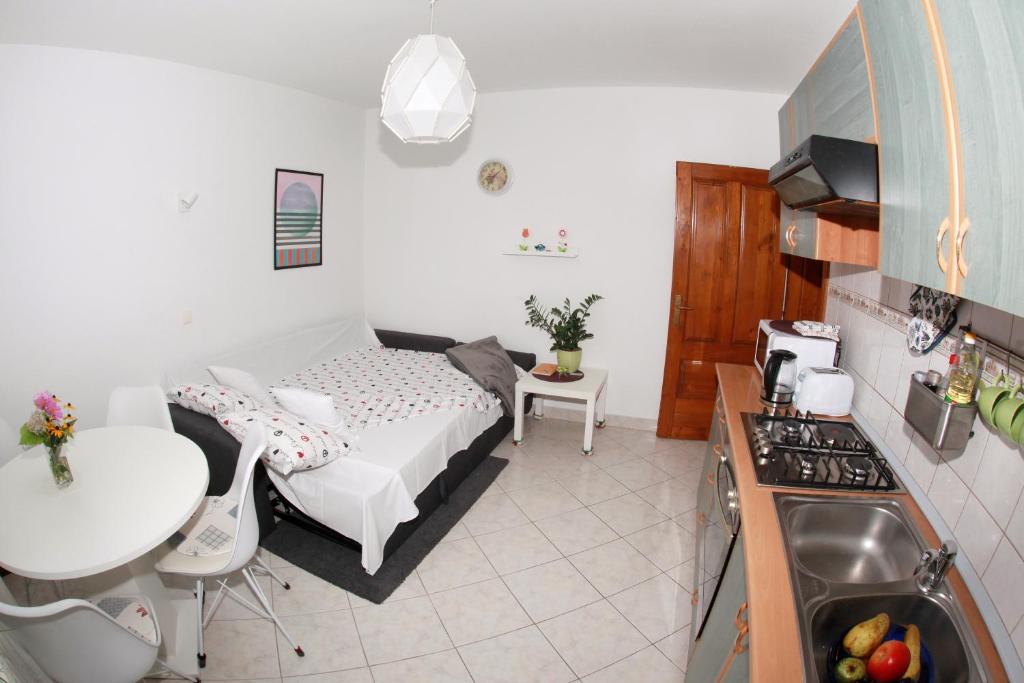 Kuchyň nebo kuchyňský kout v ubytování Apartman Malina