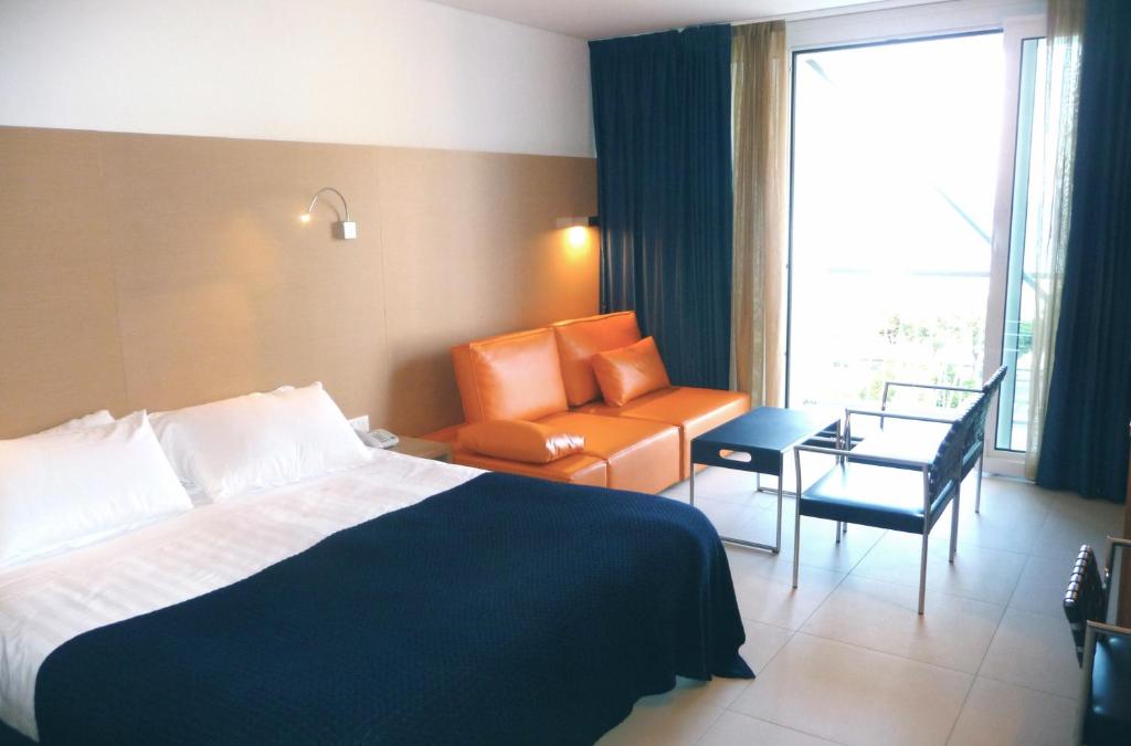 Posteľ alebo postele v izbe v ubytovaní Hotel Florida