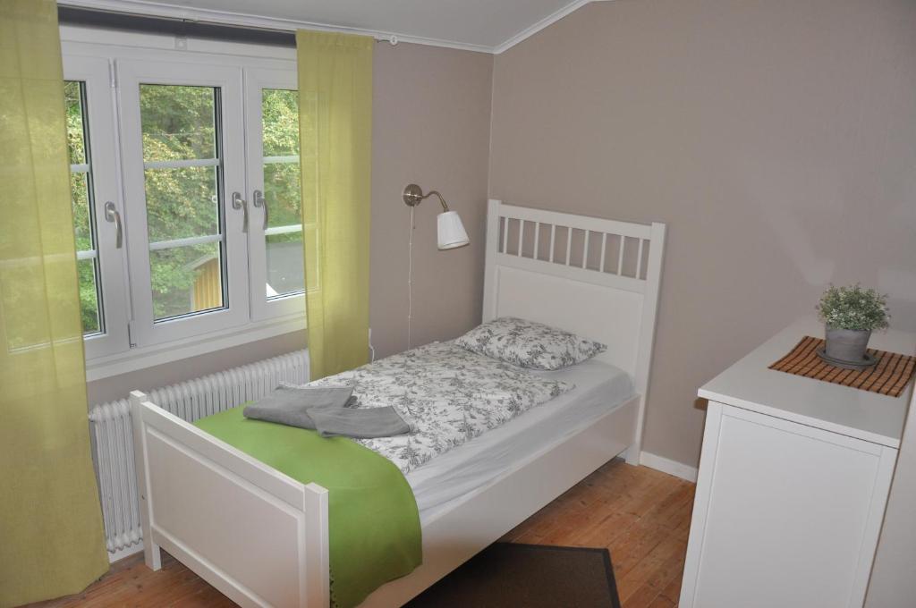 Postel nebo postele na pokoji v ubytování Hotel & Pensionat Björkelund