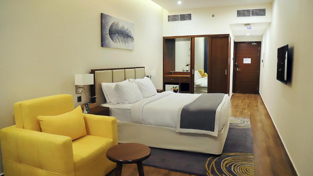Postel nebo postele na pokoji v ubytování Le Wana Hotel