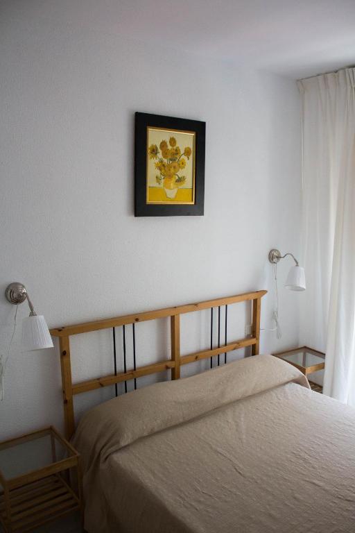 Łóżko lub łóżka w pokoju w obiekcie centrico apartamento nuevo, zona corte ingles