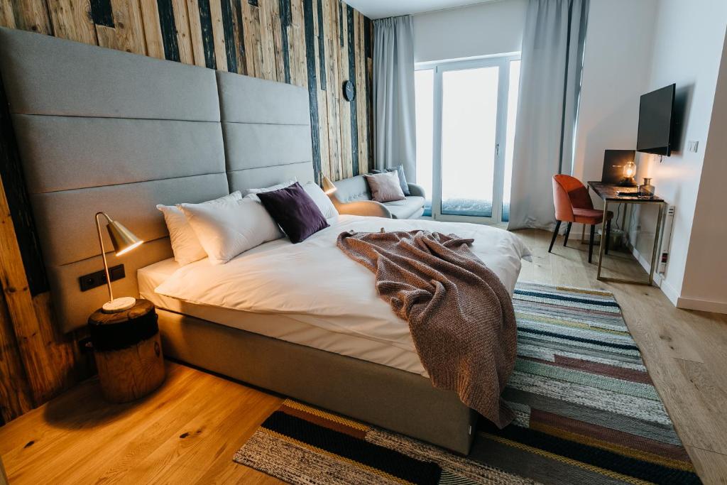 Posteľ alebo postele v izbe v ubytovaní Ski&Sun Apartamenty