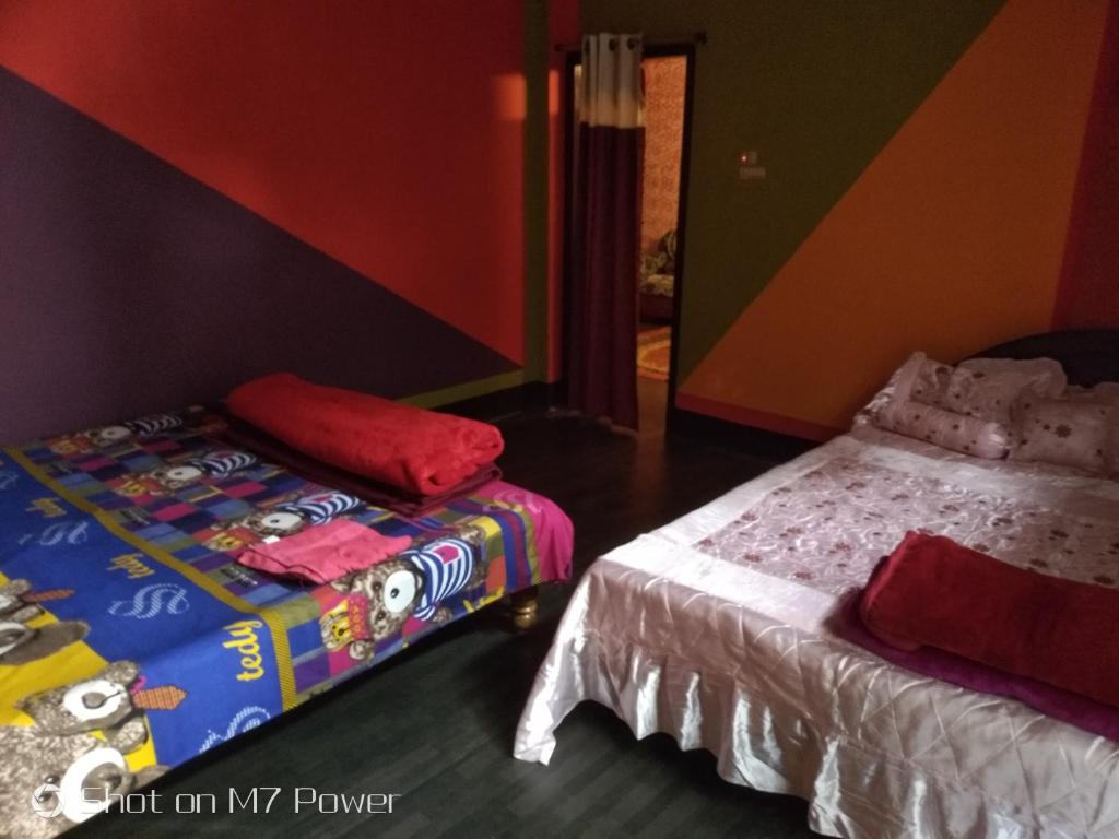 Voodi või voodid majutusasutuse Dekapara Airport Guest House toas