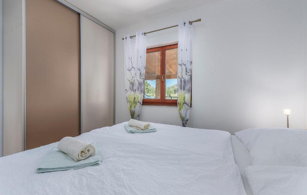 Posteľ alebo postele v izbe v ubytovaní Villa Ivda in Porec Area