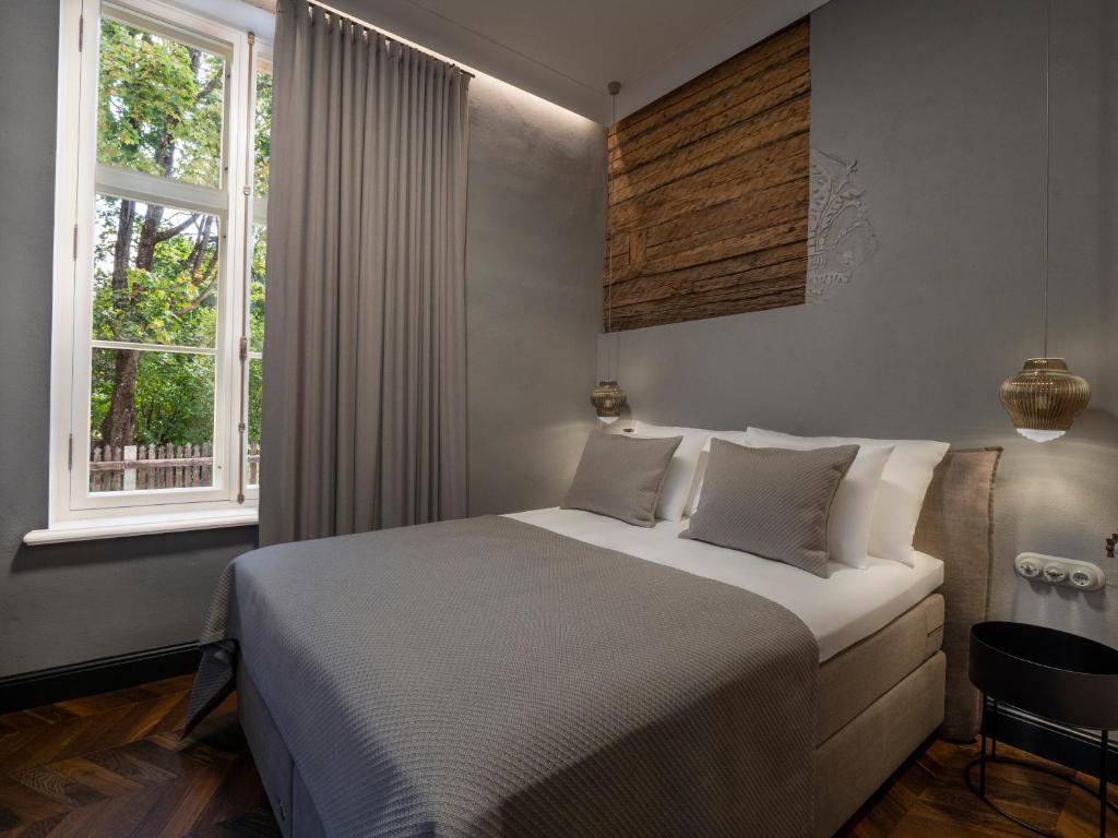 Postel nebo postele na pokoji v ubytování Boutique Hotel Rosenplänter
