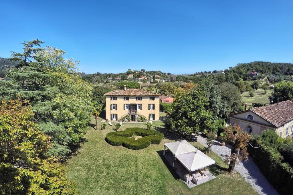 an aerial view of a large house with a garden at Villa Clara in Lucca