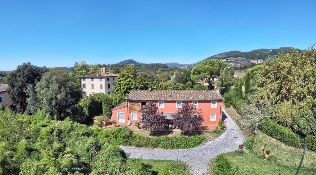 an aerial view of a house on a hill at Villa Casa Rosa in Lucca
