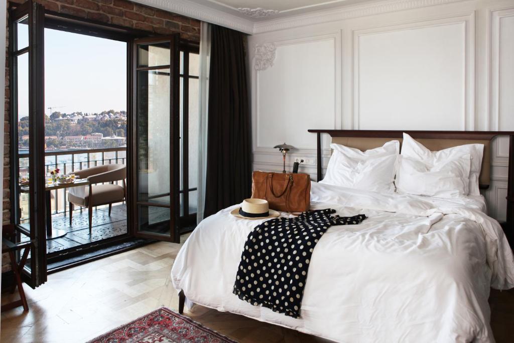Postel nebo postele na pokoji v ubytování Georges Hotel Galata