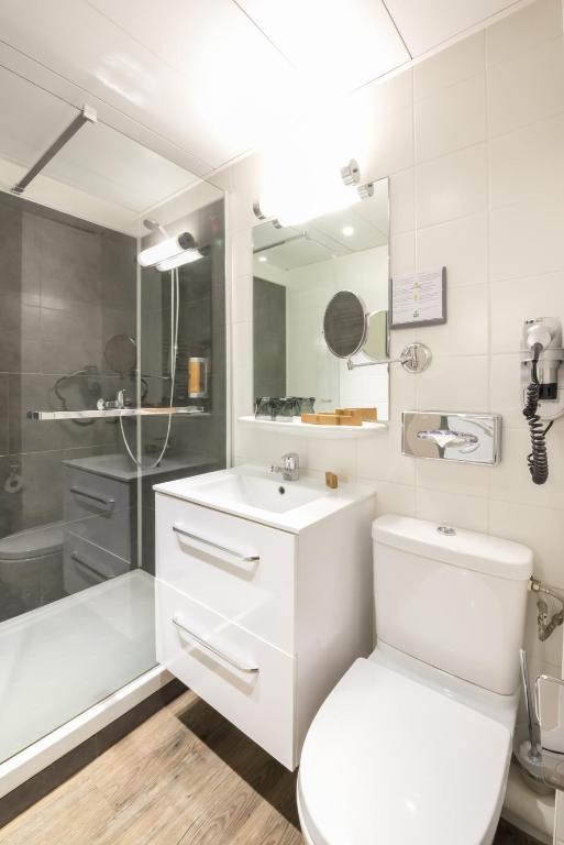 Ein Badezimmer in der Unterkunft Hotel Le Richemont