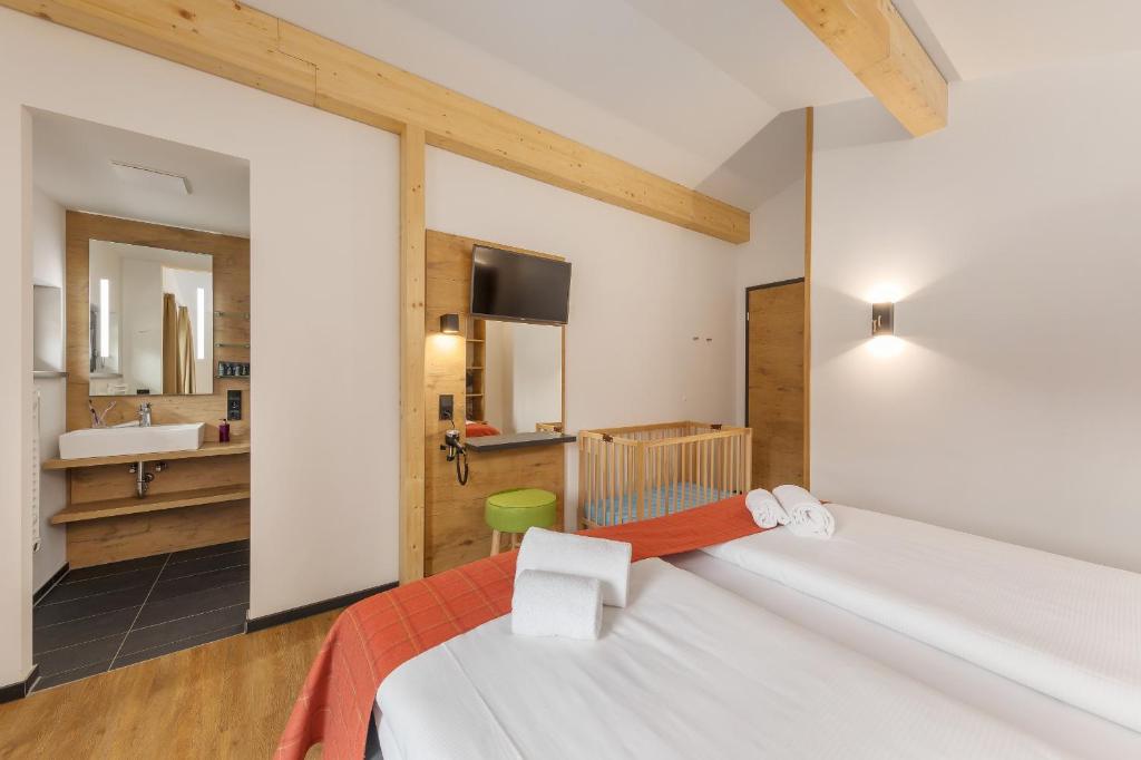 Postel nebo postele na pokoji v ubytování Center Parcs Park Allgäu
